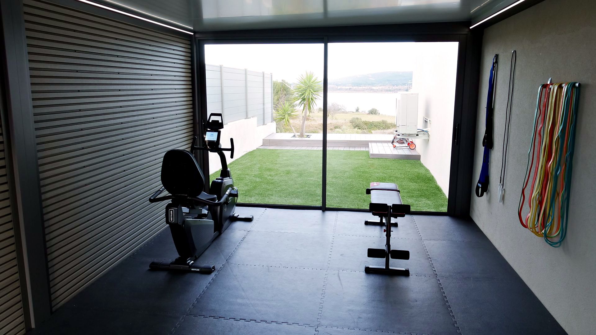 Un home gym vitré, lumineux et bien ventilé